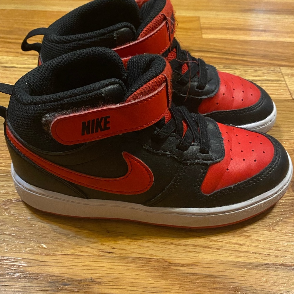 Boys Red and Black Nikes size 10 in good condition